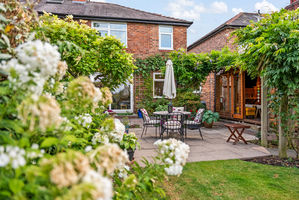 Rear Patio Area/Summerhouse - click for photo gallery